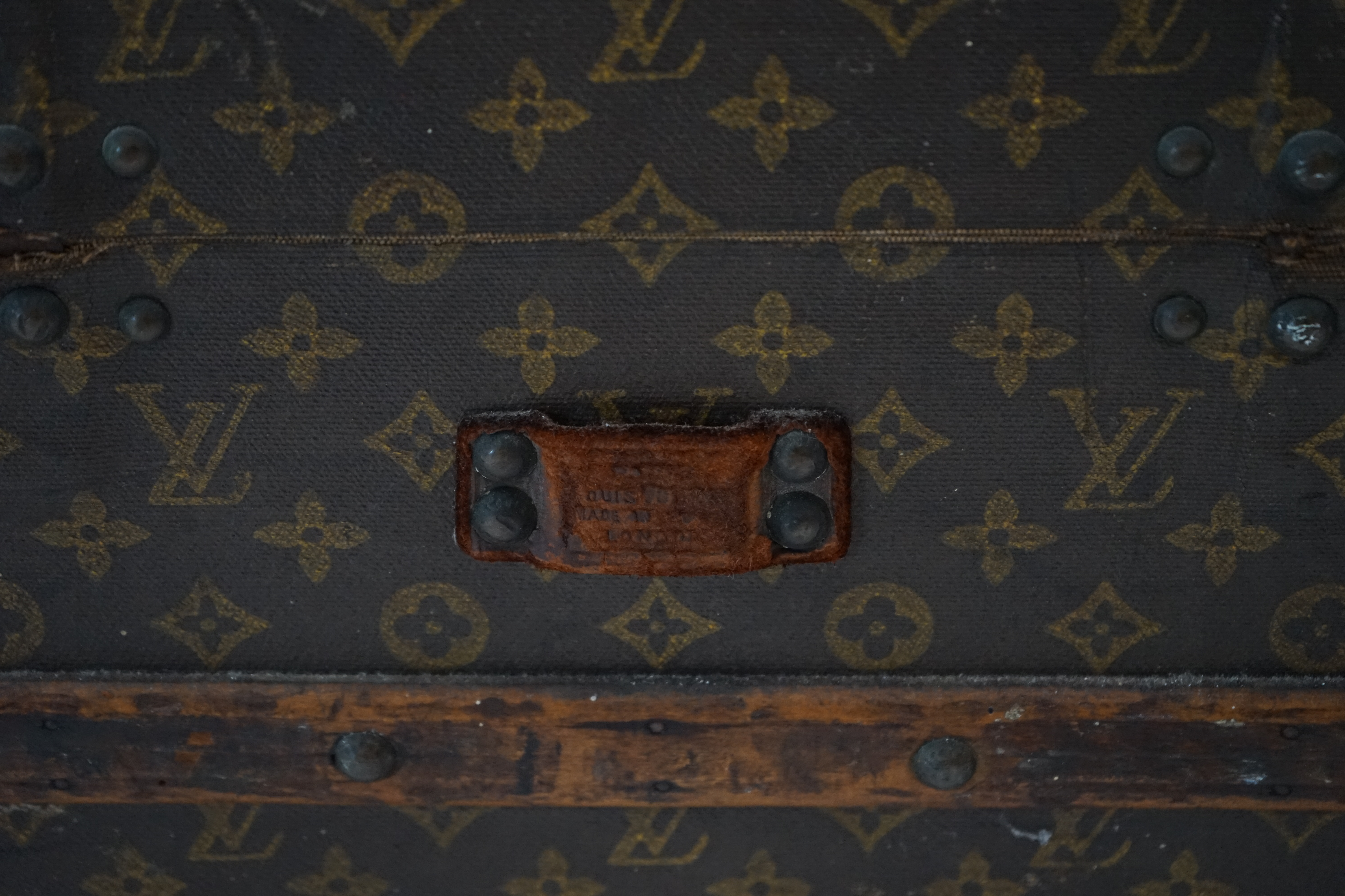 A vintage Louis Vuitton rectangular trunk, width 92cm, depth 52cm, height 34cm